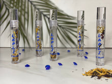 Load image into Gallery viewer, clear lip gloss tube with calendula, hibiscus and peppermint herbs